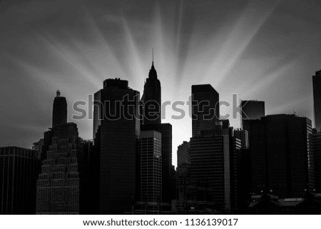 Black and white silhouettes of Manhattan. Sunset in New York City. 