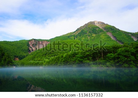 Taisho-ike pond and Mt. Yakedake, Kamikochi,Nagano, Japan