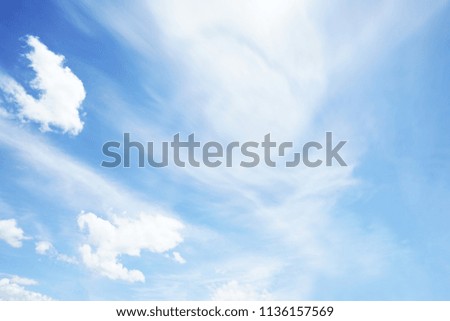 Cloud sky sunrise during morning background. Blue pastel heaven,soft focus lens flare sunlight. Abstract blurred white cyan gradient of peaceful nature. Open view windows beautiful summer spring