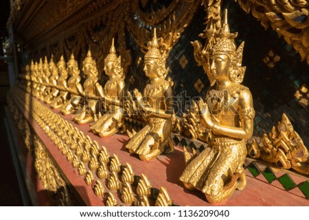 golden Thai ornament angle sculpture in Thai temple