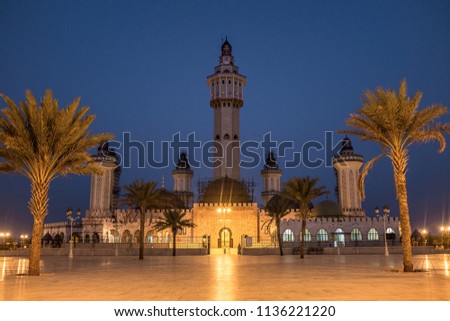 Grand Mosque of Touba at Night Royalty-Free Stock Photo #1136221220