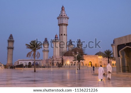 Grand Mosque of Touba at Dawn Royalty-Free Stock Photo #1136221226