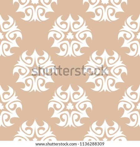 White floral ornament on beige background. Seamless pattern for textile and wallpapers