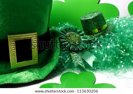 An image showing the concept of St Patricks Day with a green hat and shamrocks