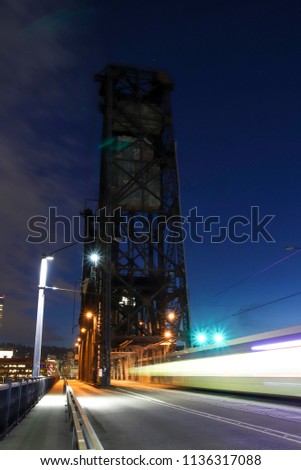 Train passing through Steel Bridge.