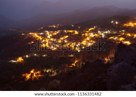 Night city in the mountains