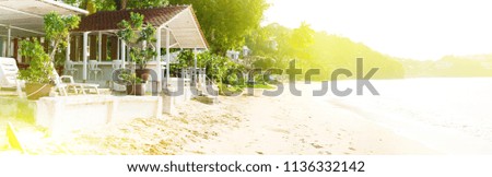 White wooden house cafe open terrace Coastal line rest on sea coast Morning light Phuket Island Panva beach Long banner