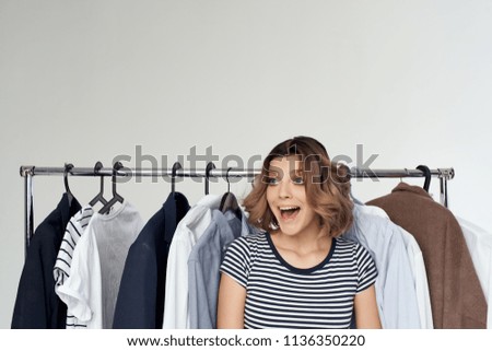 woman smiling wardrobe things                               