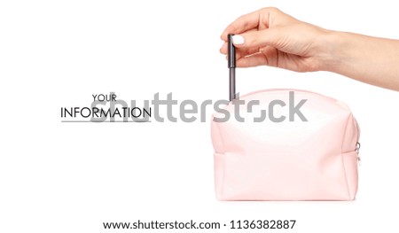 A female cosmetic bag pencil for eyes cosmetics in the hand pattern on a white background isolation