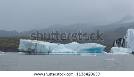 Beautiful view of icebergs in Jokulsarlon glacier lagoon, Iceland, global warming and climate change concept
