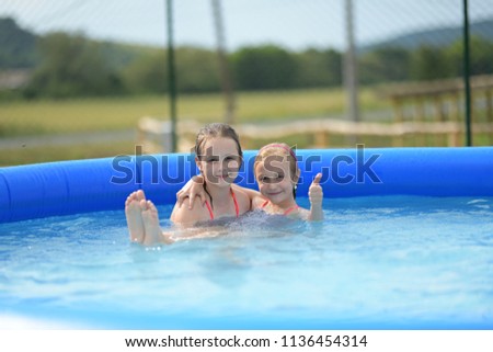 litlle sister in pool