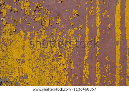 chipped paint, painted iron surface with a metal corrosion, old background with peeling and cracking paint as background or yellow texture