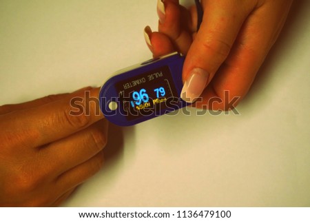 A pulse oximeter used to measure pulse rate and oxygen levels for a Patient
