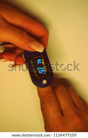A pulse oximeter used to measure pulse rate and oxygen levels for a Patient
