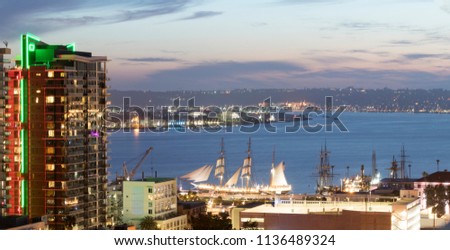 San Diego Harbor with tall ships at sunset in springtime, California, USA. "America's Finest City".