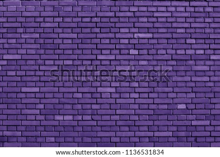 Ultra Violet colored brick wall background