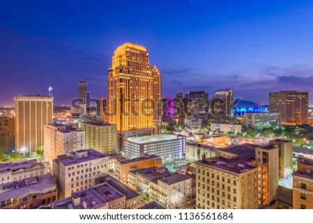 New Orleans, Louisiana, USA downtown CBD skyline at night.