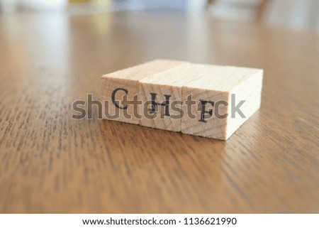 CHF (Swiss Franc) Text Block on Wooden Table