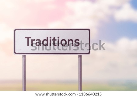 TRADITIONS - white road sign.