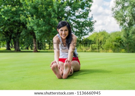 Concept of sport woman. Girl training outdoor, fit lifestyle. Modern life of young lady
