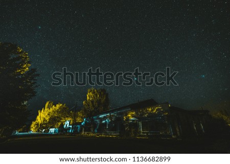 night landscape, village house under the stars at night