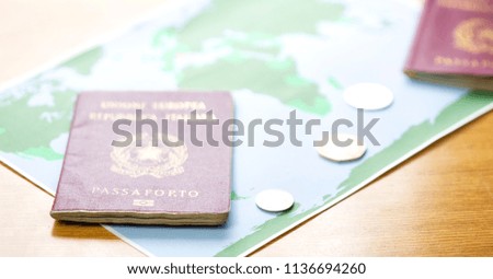 blur and passport in the world map background like concept of travel   in a table
