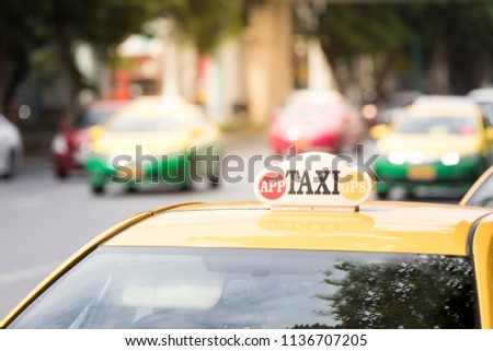 close up yellow taxi car on street 