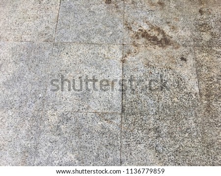 Old gray tile floor background