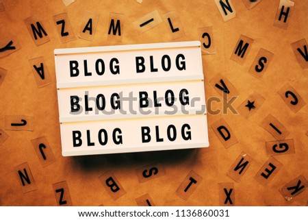 Blog and blogging concept with repeating word on lightbox