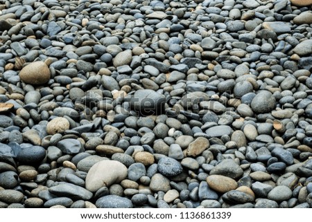 Stone pebbles texture background, Sea stones background.