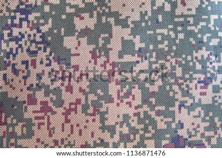 Camouflage fabric. Background and texture. 
