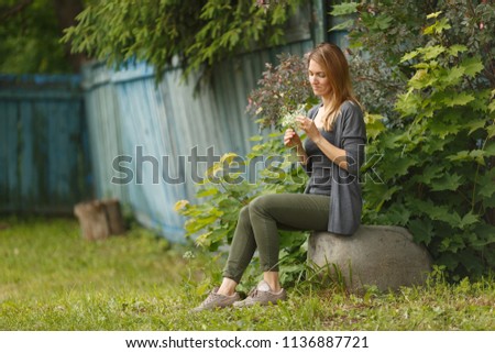 lonely woman with flowers