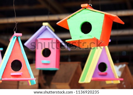 hanging colorful wooden bird house