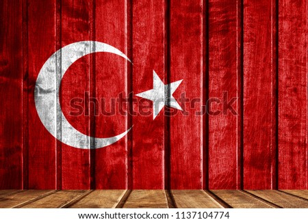 Wooden background with a flag of Turkey.