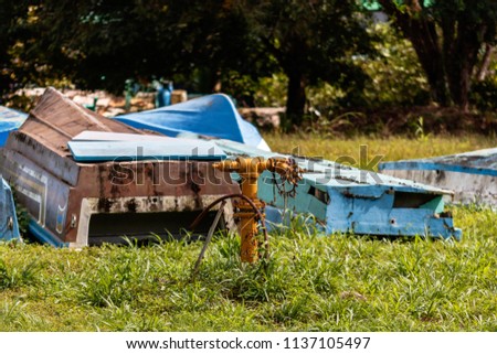 Old fishing boat on green grass of Golfito, Costa Rica.

Day to day life in the small village of Golfito, Costa Rica.