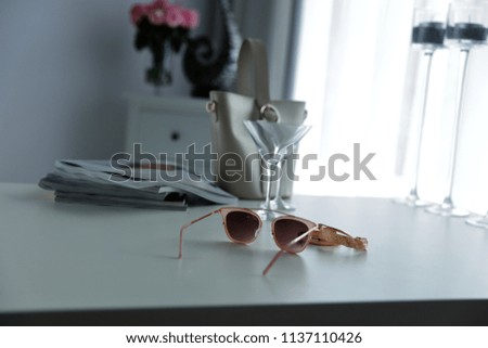 Table background and sunglasses 