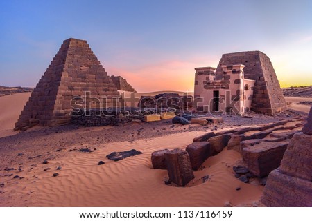 Pyramids of Meroe, Sudan. Meroë is an ancient desert pyramid city, east bank of the Nile near Shendi, Sudan, approximately 200 km north-east of Khartoum in the desert Royalty-Free Stock Photo #1137116459