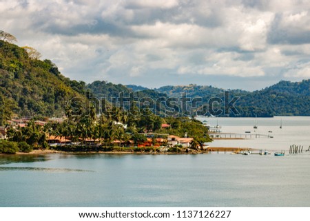View over the coastline of Golfito, Costa Rica. Royalty-Free Stock Photo #1137126227