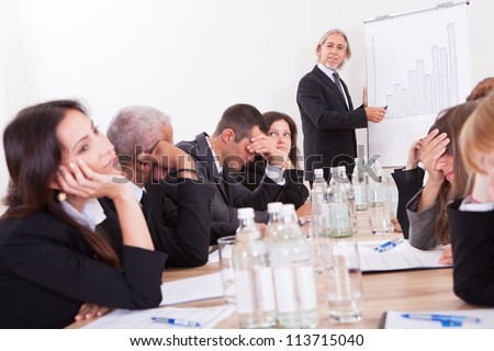 Photo Of Sad Business Team Attending The Seminar