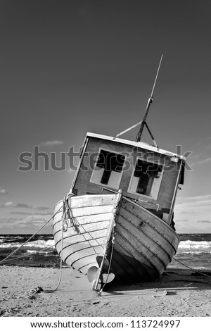 Fishing Boat at the Baltic Sea Coast of Usedom Island, Germany Royalty-Free Stock Photo #113724997