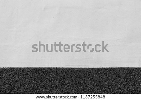 Texture of wall and plaster. Horizontal line. Minimalism. Black and white photo
