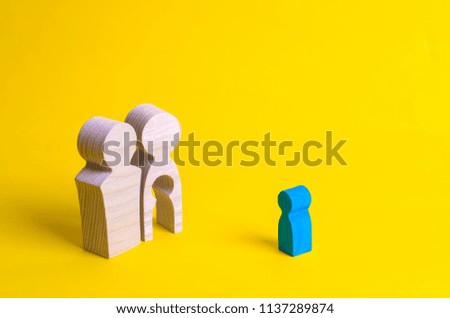 Wooden figures of a man and a woman with a void inside the body in the form of a child. Infertility in a couple. Loss of a single child. Medical problems. The couple wants to have a baby.