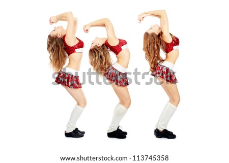 Group of professional cheerleaders posing at studio. Isolated over white.