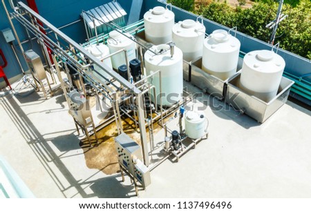 Chemical pump used in waste water treatment,water filtration plants.the feed pump chemical into the pipe water Royalty-Free Stock Photo #1137496496