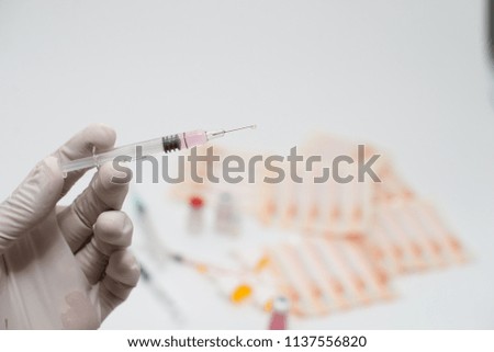 medical injection in hand, injecting injection vaccine medicine.
