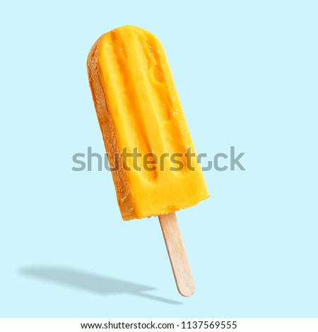 Fruit ice cream on a stick. Bright color, summer mood. Royalty-Free Stock Photo #1137569555