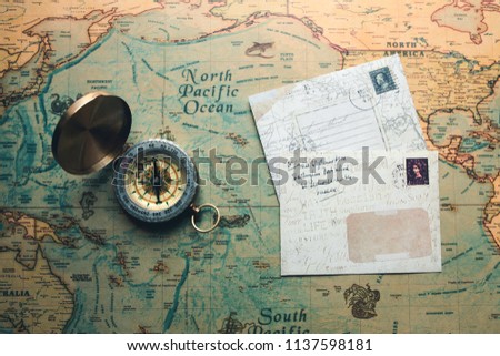 vintage retro compass on a map discover travel concept