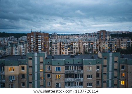 Aerial view of town with socialist soviet panel building (plattenbau) at evening. Buildings were built in the Soviet Union (now Ukraine). The architecture looks like most post-soviet commuter towns.