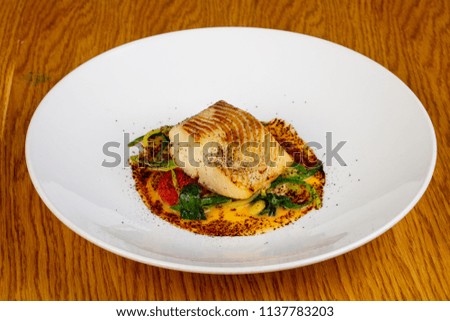 Roasted fish halibut with spices