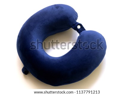  Blue travel pillow isolated on white background. Royalty-Free Stock Photo #1137791213
